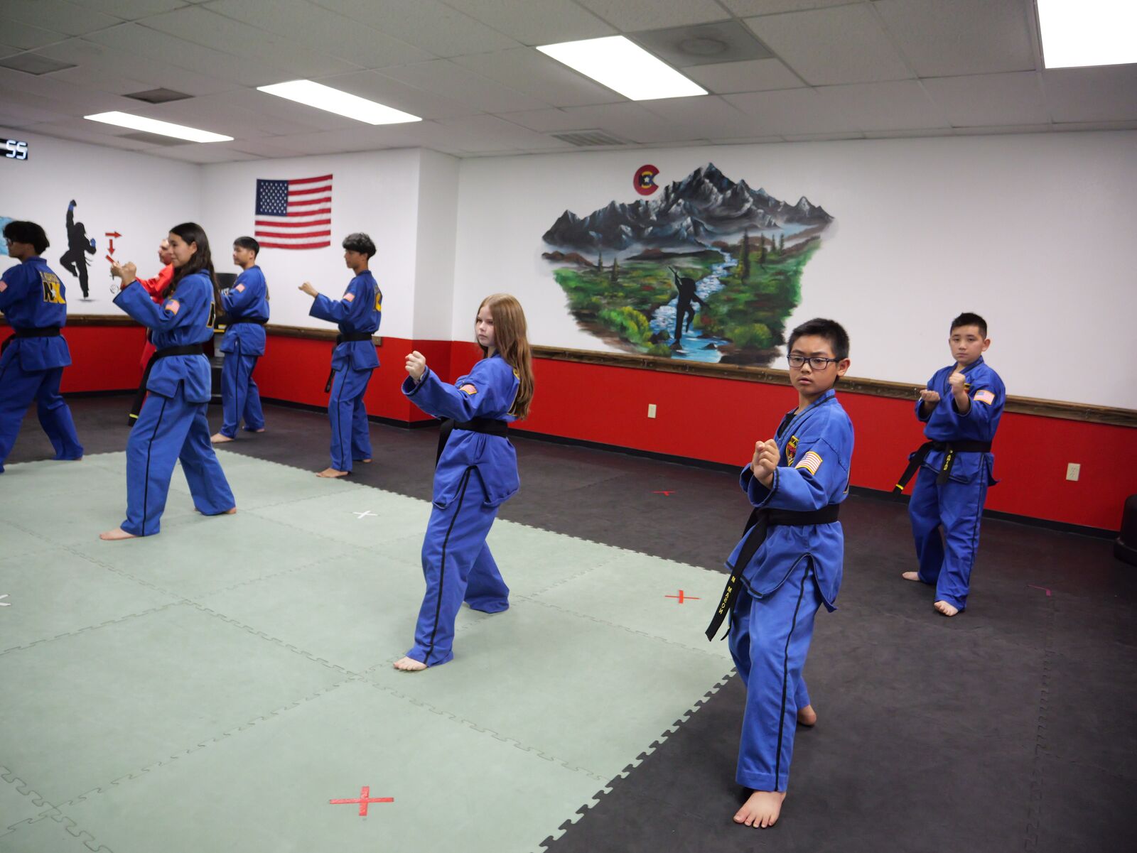 Teen students holding a synchronized form