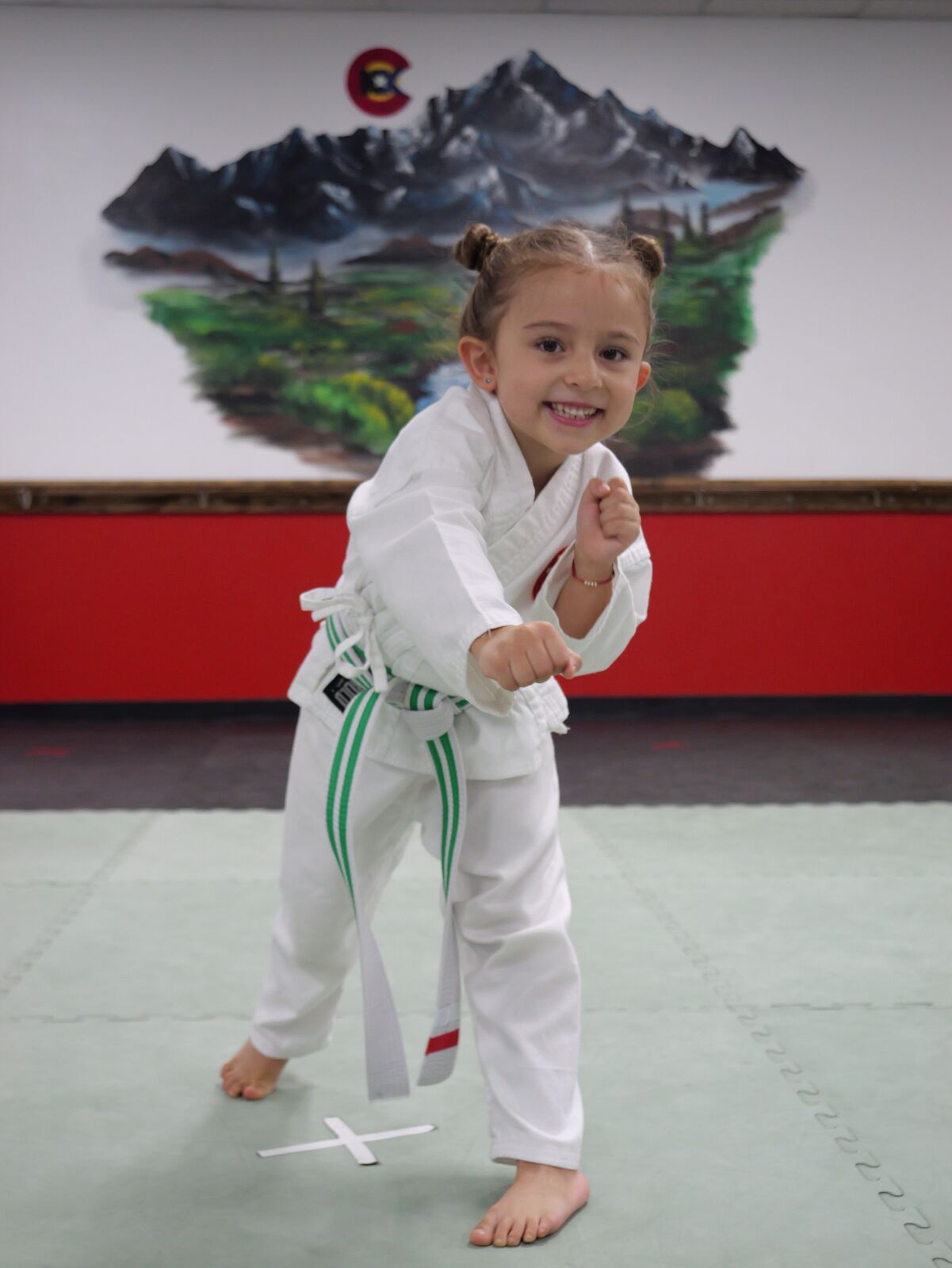 Instructor working one-on-one with a young student